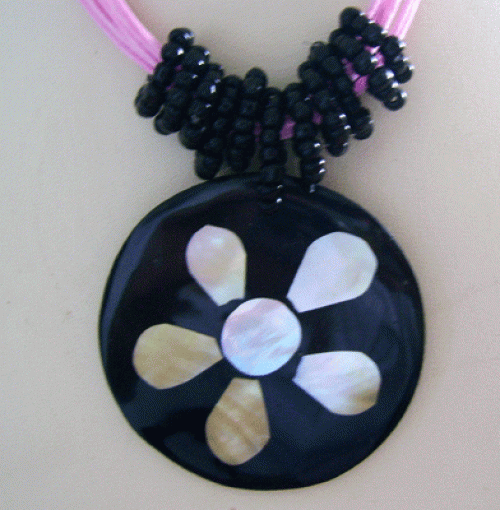 white mop and receine necklace